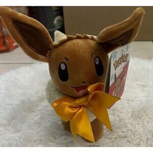 New POKEMON Eevee Plush Toy with yellow ribbon